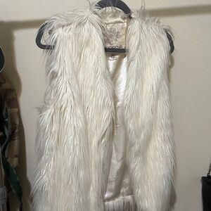 White faux fur vest
